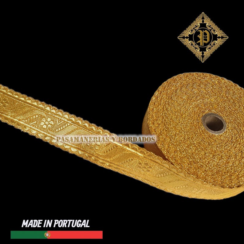 May include: A roll of gold-colored trim with a detailed floral and geometric pattern. The trim is labeled "PASAMANERIAS Y BORDADOS" and "MADE IN PORTUGAL". The trim is likely used for decorative purposes in sewing or crafting projects.