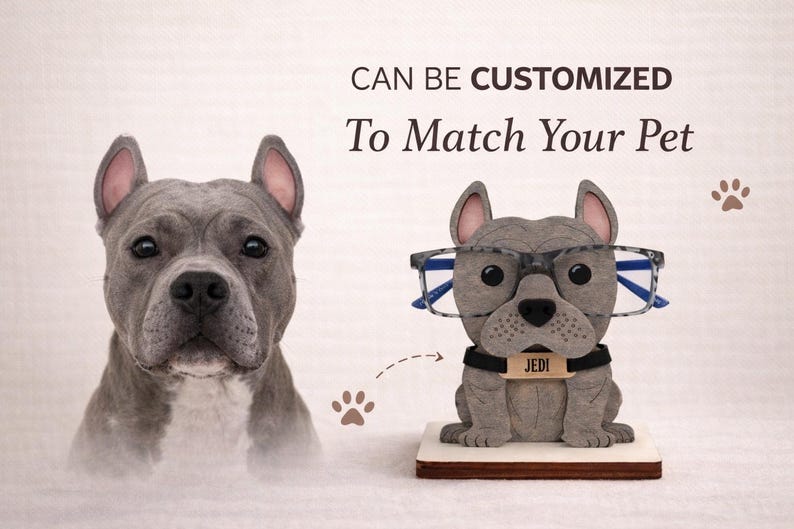 May include: A gray dog sculpture wearing glasses and a name tag that says "JEDI". The text above the sculpture says "CAN BE CUSTOMIZED To Match Your Pet". A realistic dog portrait is on the left.
