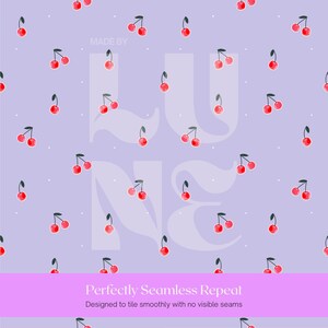 A seamless pattern of red cherries with green stems on a pale purple backdrop.
