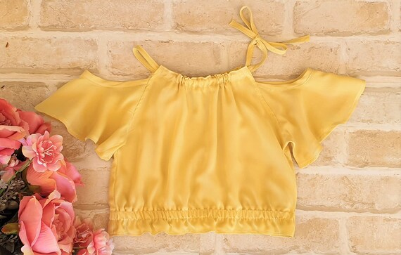 gold cold shoulder top