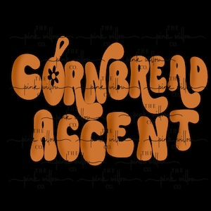 Puede incluir: Diseño gráfico marrón sobre fondo negro con las palabras "CORNBREAD ACCENT" en una fuente retro. Un pequeño gráfico de flores está encima de la letra "O" en "CORNBREAD".