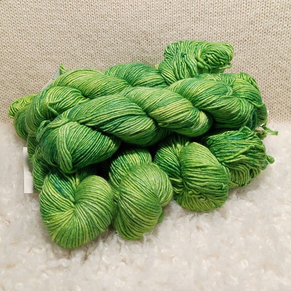 Malabrigo Silky Merino, Dill, variegated tonal yarn, Merino and Silk DK yarn for knitting, crochet, weaving, crafts. Kettle dyed