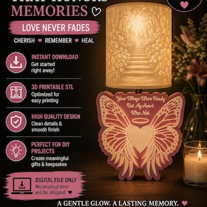 May include: A lighted tribute with the text "A Lighted Tribute That Honors Memories." The image features a lamp with a forest scene and a butterfly-shaped memorial with the text "Your Wings Were Ready But My Heart Was Not."