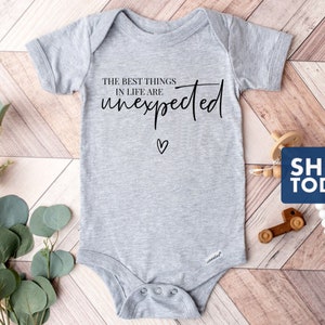 The Best Things In life are Unexpected Baby Onesie® - 100% Cotton - Available in White, Pink or Grey