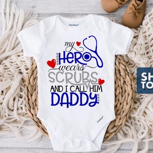 My Hero Wears Scrubs and I Call Him Daddy Baby Onesie® - White 100% Cotton