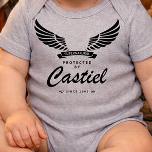 Protected By Castiel Onesie® | Supernatural Baby Bodysuit