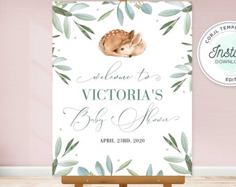May include: A white welcome sign with green leaves and a fawn illustration. The sign reads "Welcome to Victoria's Baby Shower" and "April 23rd, 2020".