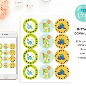 May include: Printable dinosaur birthday party favor stickers. The stickers are round and feature a green dinosaur with a party hat and a blue dinosaur with a crown. The text on the stickers says "Happy 1st Birthday" and "Oliver's 1st Birthday".
