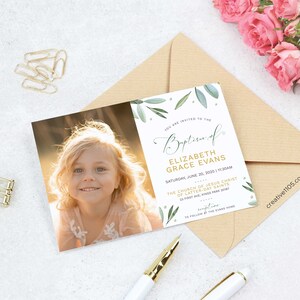 May include: A baptism invitation with a green leafy design and gold lettering. The invitation reads "You are invited to the Baptism of Elizabeth Grace Evans, Saturday, June 20, 2020 | 11:30 AM, The Church of Jesus Christ of Latter-day Saints, 23 First Ave, Kings Park 2087". A photo of a young girl with blonde hair is in the top left corner of the invitation.