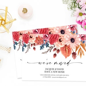 May include: A white card with a floral border and the text "we've moved" in black script. Below the text is the message "Jacquie & David have a new home" followed by their new address and contact information.