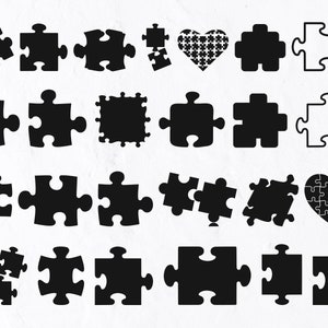 May include: A set of 18 black puzzle piece silhouettes in various shapes and sizes, including a heart shape. Some of the pieces are joined together, while others are separate.