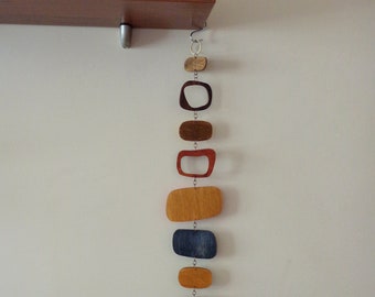 Moderne houten wanddecoratie uit het midden van de eeuw: geometrisch muurdecor