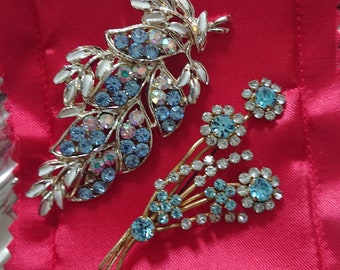 Two gorgeous 1960s silver and gold tone brooches