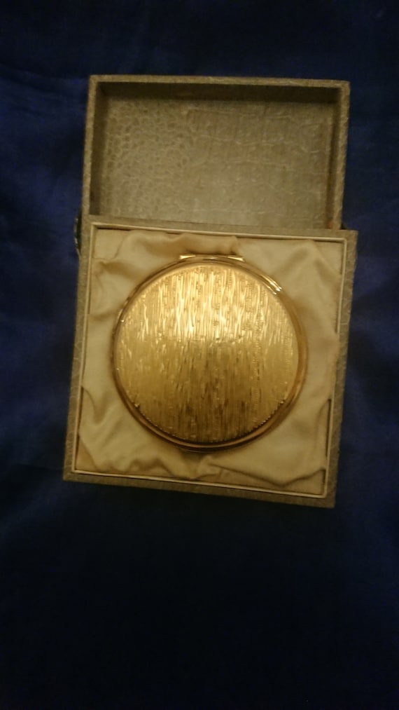 Lovely gold tone unused Stratton powder compact