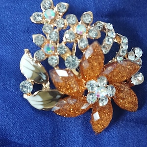 Lovely gold tone diamanté enamel orange flower gold tone brooch