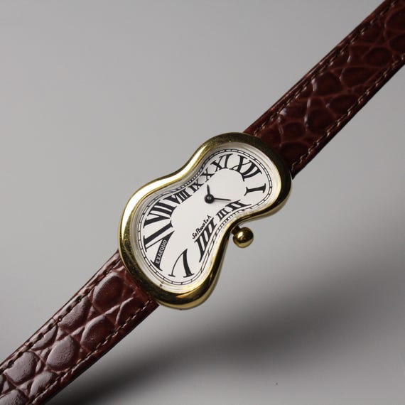 Cartier melting clock watch new arrivals