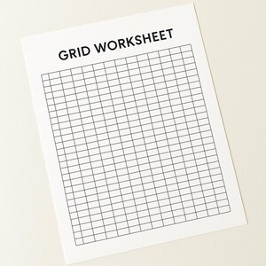 May include: A white sheet of paper with a black grid pattern and the words "GRID WORKSHEET" printed at the top. The grid is composed of evenly spaced horizontal and vertical lines, creating a series of squares. The paper is clean and crisp.