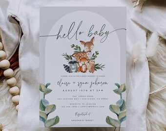 May include: A baby shower invitation with a watercolor illustration of woodland animals, including a deer, fox, owl, and raccoon. The invitation reads "hello baby" and includes the names "claire + ryan johnson" and the date "August 15th at 3pm".
