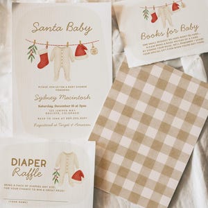 May include: Baby shower invitations and inserts with a Christmas theme. The main invitation reads "Santa Baby" and includes a onesie, stocking, and Santa hat illustration. Other inserts include "Books for Baby" and "Diaper Raffle" cards.