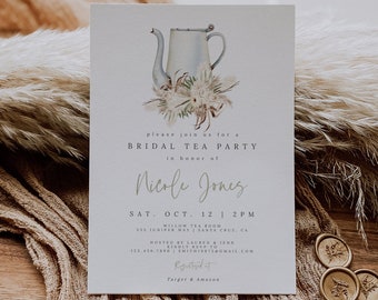 May include: A white invitation card with a watercolor illustration of a teapot and flowers. The text reads "Please join us for a Bridal Tea Party in honor of Nicole Jones. Sat. Oct. 12 | 2 PM. Willow Tea Room. 555 Juniper Way | Santa Cruz, CA. Hosted by Lauren & Jenn. 123.456.7890 | smithirsts@gmail.com. Registered at Target & Amazon."