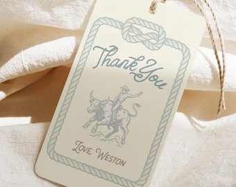 May include: A cream-colored gift tag with a rope border and a cowboy illustration. The tag reads "Thank You" in script and "Love, Weston" below the illustration. A twine string is attached at the top.