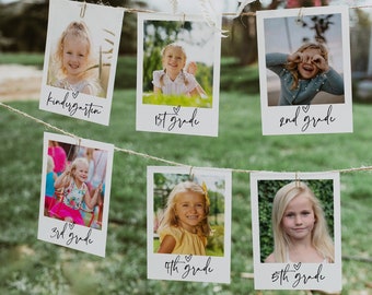 May include: A string of white photo cards with pictures of children and the words "kindergarten", "1st grade", "2nd grade", "3rd grade", "4th grade", and "5th grade" written on them.
