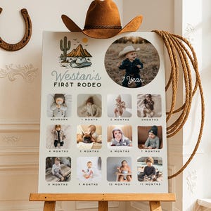 May include: A milestone photo board with the text "Weston's First Rodeo" and a photo of a child in a cowboy hat. The board displays photos from newborn to 11 months. A brown cowboy hat and rope are placed on the easel.