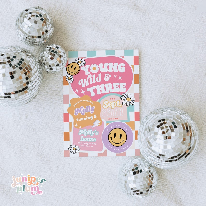 May include: A pink and blue party invitation with a checkered background. The invitation says "Young Wild & Three" and has a daisy and smiley face design. The invitation is for Molly's 3rd birthday party on September 20th at 3pm.