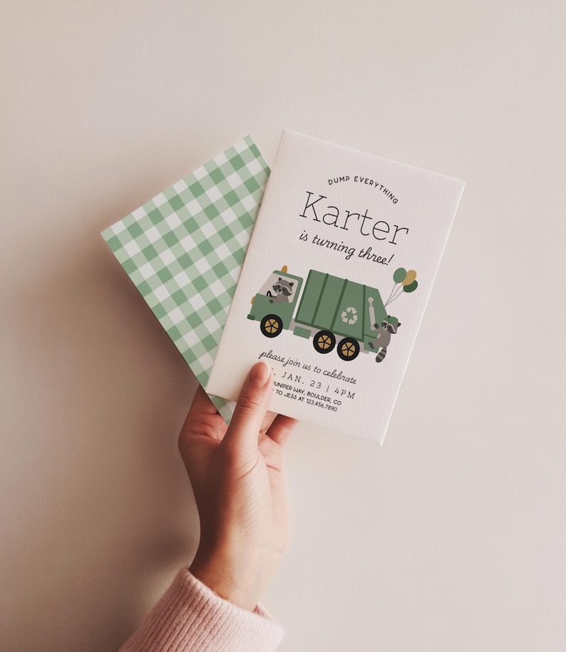 May include: A birthday invitation with a green garbage truck illustration, raccoons, and balloons. The text reads "Karter is turning three!" with event details. A green and white gingham envelope is also visible.