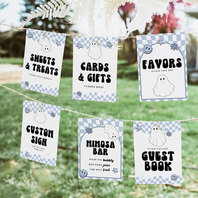 May include: A collection of party signs with a blue and white checkered pattern, featuring ghost and star graphics. The signs include text such as "Sheets & Treats," "Cards & Gifts," "Favors," "Custom Sign," "Mimosa Bar," and "Guest Book."