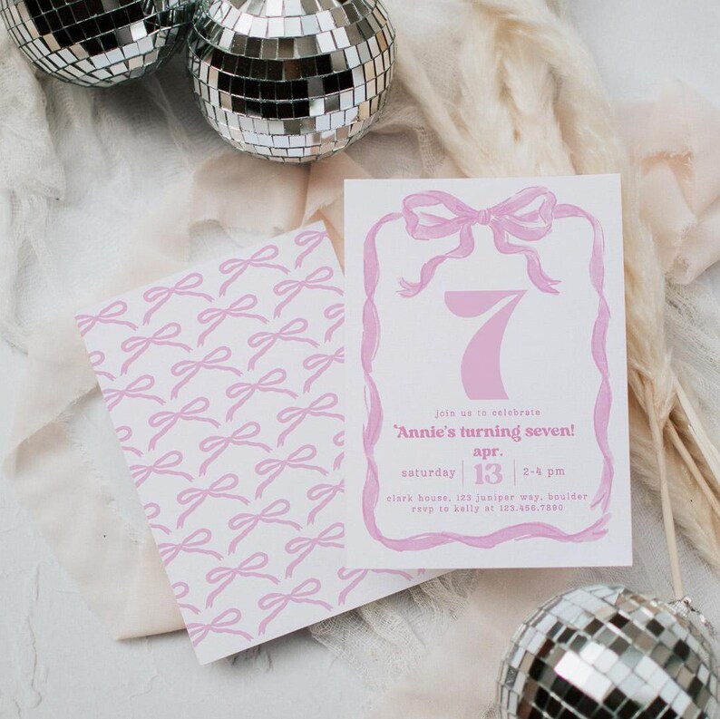 May include: Pink invitation with a pink bow and the number seven. The text reads "Join us to celebrate 'Annie's turning seven!'". The date is Saturday, April 13th, from 2-4 pm. The location is Clark House, 123 Juniper Way, Boulder. RSVP to Kelly at 123.456.7890.