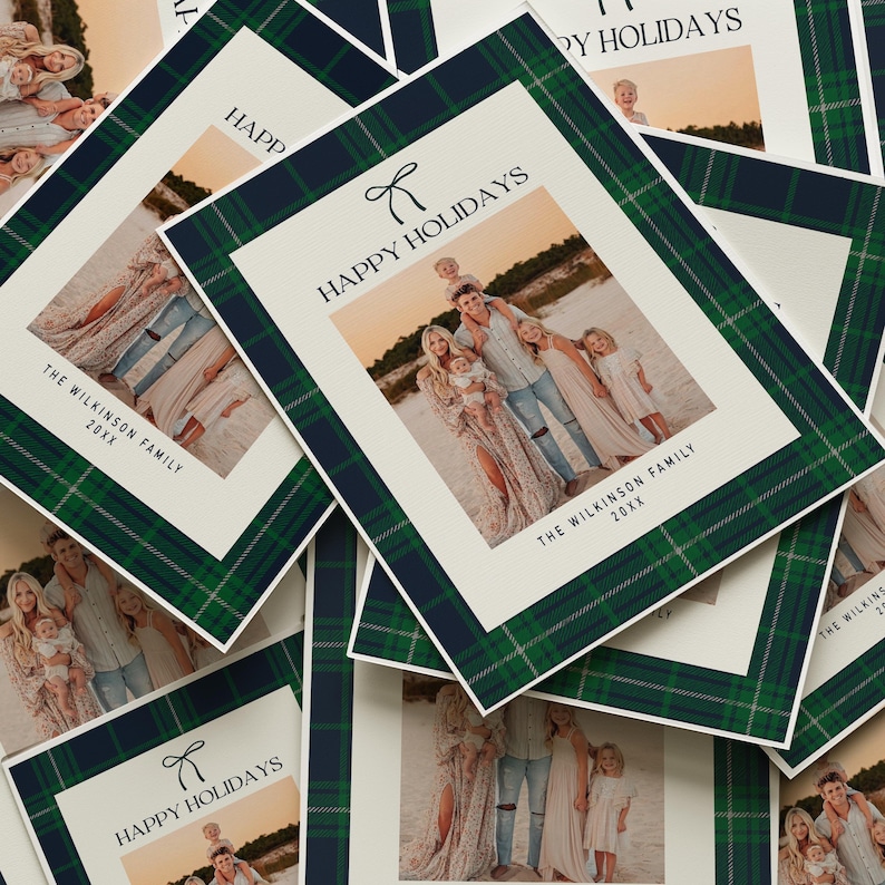 May include: Holiday cards with a family photo, featuring a green and navy plaid border. The cards have the text "HAPPY HOLIDAYS" and "THE WILKINSON FAMILY 20XX". The family photo shows a group of people on a beach.