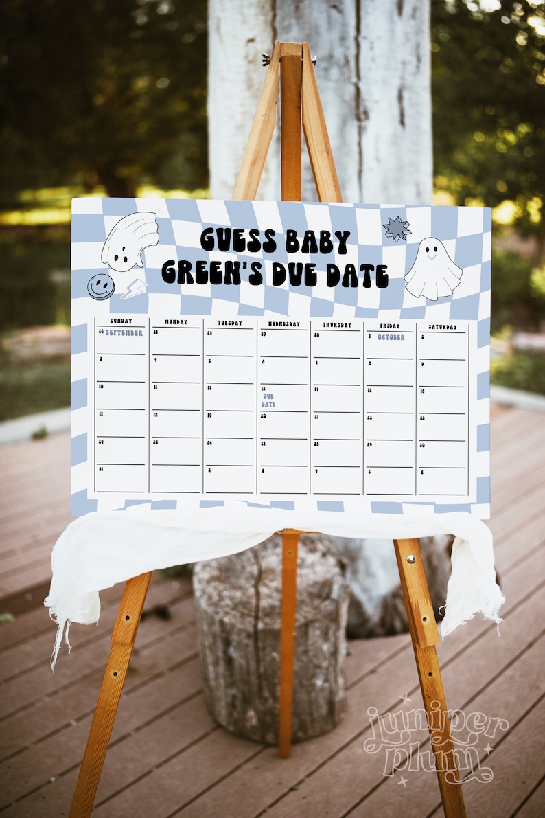 May include: A baby shower sign on a wooden easel. The sign has a blue and white checkered background with the text "GUESS BABY GREEN'S DUE DATE". It includes a calendar grid with the month of September and October. Decorative ghost and star graphics are included.