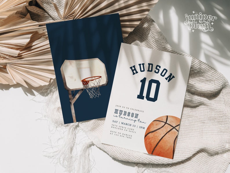 May include: A basketball-themed birthday invitation with a blue and white color scheme. The invitation features a basketball hoop, a basketball, and the text "HUDSON 10". The invitation also includes the date and time of the party, as well as the address and RSVP information.