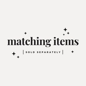 May include: Black and white graphic design with the text "matching items" and "sold separately" with small star accents.