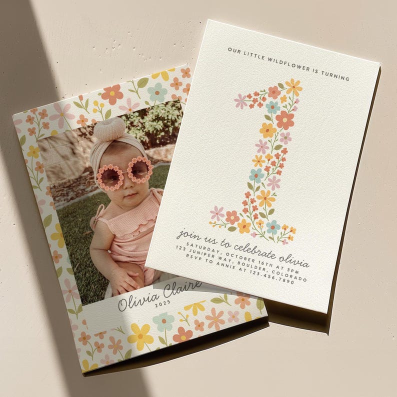 May include: Two invitations for a first birthday celebration. One features a photo of a baby wearing sunglasses, the other has a floral number one. Text includes "Our Little Wildflower is Turning" and party details.