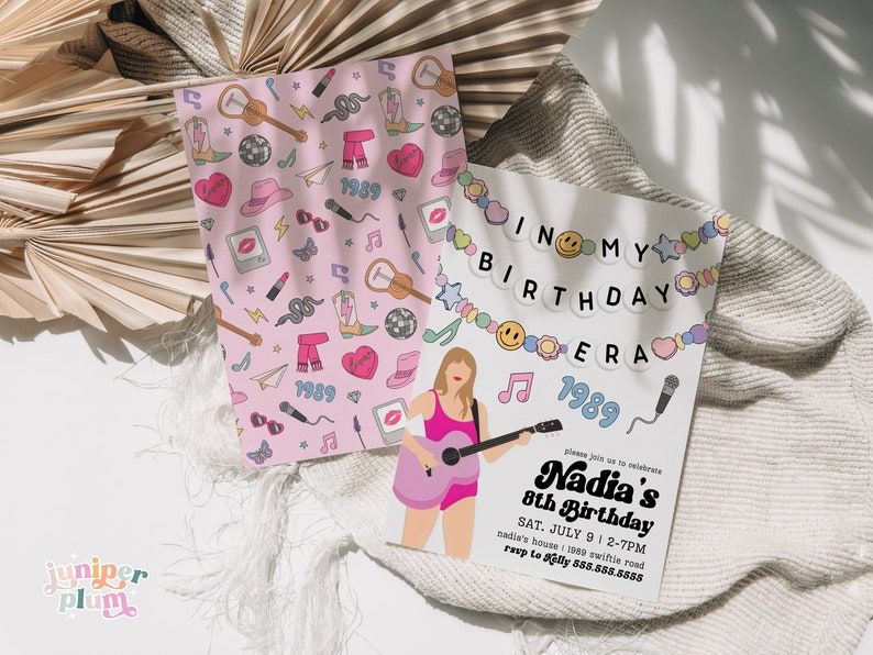 May include: A pink and white birthday invitation with a cartoon illustration of a woman playing a guitar. The invitation says "In My Birthday Era 1989" and includes the text "Please join us to celebrate Nadia's 8th Birthday, Sat. July 9 2-7PM, Nadia's house 1989 Swiftie Road, RSVP to Jilly 888.888.8888".