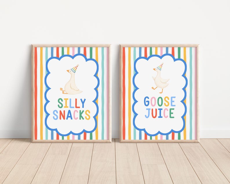 May include: Two framed prints with a colorful vertical striped background. Each print features a white goose wearing a party hat inside a blue cloud shape. One print says "SILLY SNACKS" and the other says "GOOSE JUICE".
