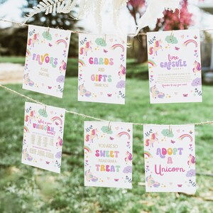 Puede incluir: Cinco carteles imprimibles con tem&aacute;tica de unicornio. Los carteles est&aacute;n decorados con arco&iacute;ris, nubes, mariposas y corazones. Los carteles dicen: "Favors, Please Take One", "Cards and Gifts, Thank You", "Time Capsule - 2044 - To be opened when Olivia is 18. Remember to sign your name!", "What is your unicorn name?", "You are so sweet, please grab a treat", and "Adopt a Unicorn".
