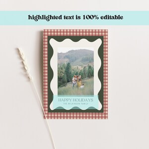 May include: Holiday greeting card with a family photo inside a white scalloped frame, set against a dark green background. The card has a red and white checkered border. Text at the bottom reads "HAPPY HOLIDAYS" and "THE WILKINSON FAMILY". The top text says "highlighted text is 100% editable".