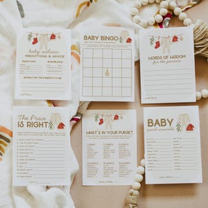 May include: A set of baby shower game cards in neutral tones, decorated with illustrations of baby clothes and festive elements. The cards display text such as "Baby Bingo," "Predictions & Advice," and "The Price is Right."