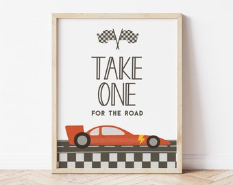 May include: A printable wall art design featuring a red race car with a yellow lightning bolt on a checkered flag finish line. The text reads "Take One For The Road" with two crossed checkered flags above the text.