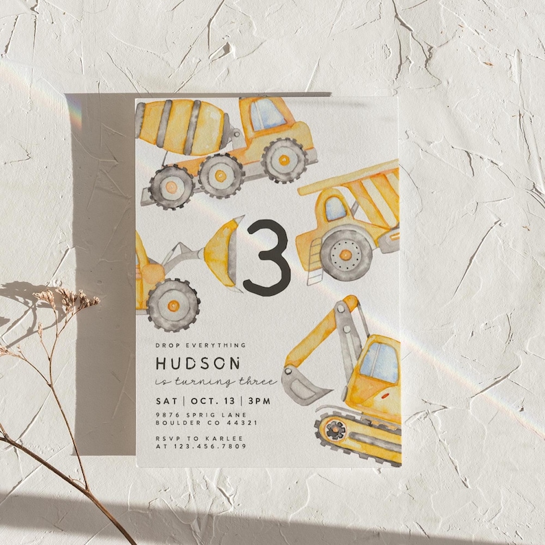 May include: A watercolor-style birthday invitation featuring yellow construction vehicles, the number 3, and the text "HUDSON is turning three." The invitation includes date, time, and RSVP information.