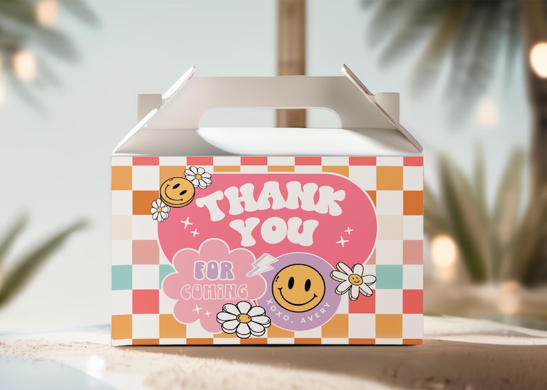 May include: A white favor box with a checkered pattern in pink, orange, and blue. The box has a handle and says "Thank You" in pink letters with a pink and white smiley face and the text "For Coming" in a pink cloud. The box also says "XOXO, Avery" in black letters.
