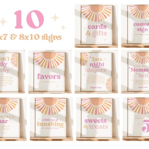 Peut inclure: Dix pancartes imprimables pour une f&ecirc;te pr&eacute;natale avec un motif de soleil &eacute;clatant rose et orange. Les pancartes comprennent des textes tels que "Ne dites pas b&eacute;b&eacute;", "Couches de nuit", "Quelle est la taille du ventre de maman ?", "Bar &agrave; mimosa", "Un petit rayon de soleil est presque l&agrave;", "Douceurs et friandises", et "Favors".