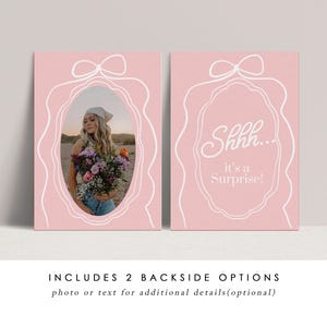 May include: Two pink cards with white line art. One card features a photo of a person holding flowers within an oval frame. The other card has the text "Shhh... it's a Surprise!" inside a similar frame. Both cards have a bow at the top.