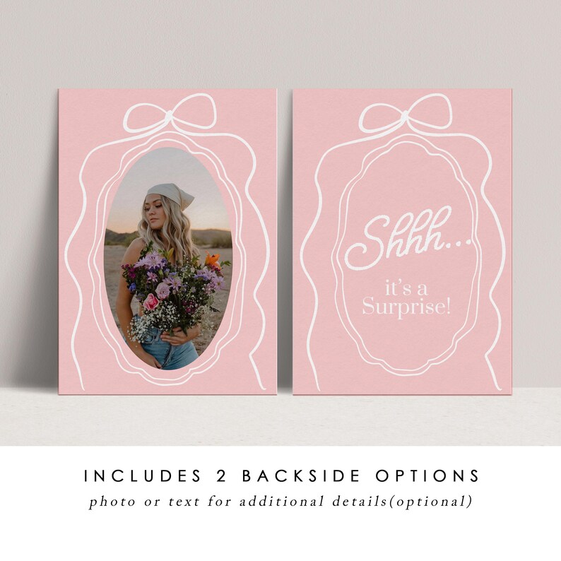 May include: Two pink cards with white line art. One card features a photo of a person holding flowers within an oval frame. The other card has the text "Shhh... it's a Surprise!" inside a similar frame. Both cards have a bow at the top.