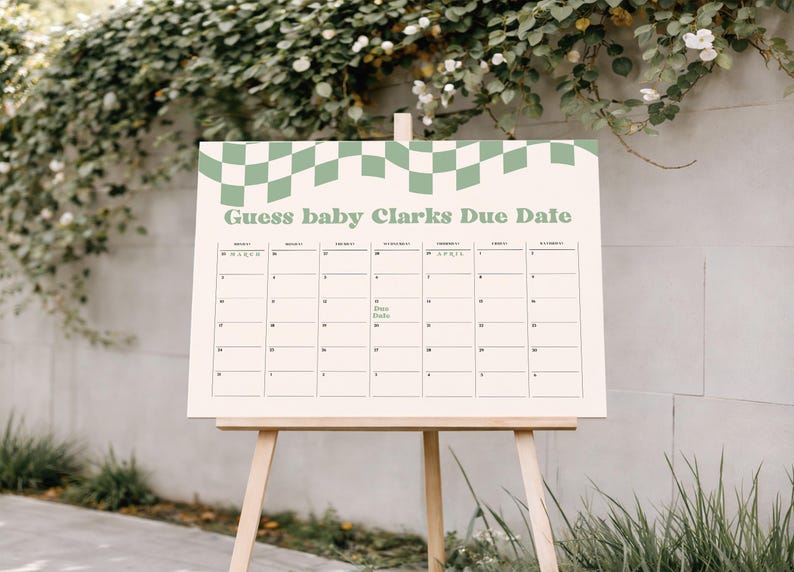 May include: A rectangular sign on a wooden easel featuring a cream background with a sage green checkered border at the top. The text reads Guess baby Clarks Due Date above a calendar grid with the months of March and April and the words Due Date.