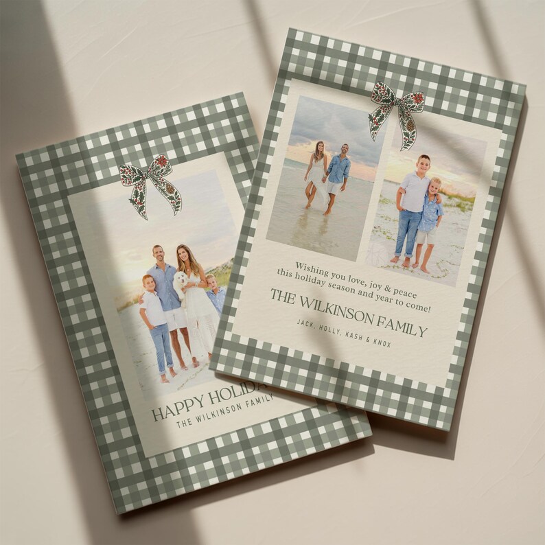 May include: Two holiday cards with family photos. The cards have a green and white gingham border and a decorative bow. The text on the cards reads "Wishing you love, joy & peace this holiday season and year to come!" and "HAPPY HOLIDAY".