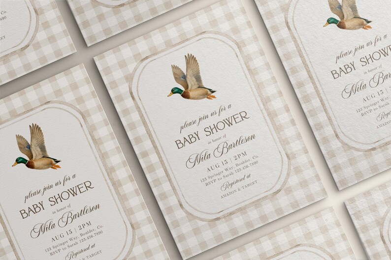 May include: Baby shower invitations with a duck illustration. The invitations have a beige gingham background and a cream-colored frame with the text "Baby Shower" and event details. The duck is brown, green, and orange.